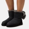 Ugg Mini Bailey Fuzzy Bow - Snowboots- Black -Ugg 804d05b53f104d23bfd5d34ac0297970